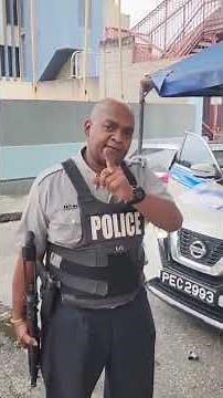 Cop vs civilian outside Besson Street Police Station