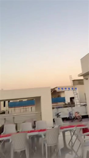 Amal's Joyful Kite Flying in the Sky