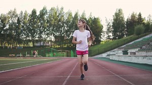 Child Jogging In Stadium: Outdoor Sports Kids Stock Footage SBV-324488325 - Storyblocks