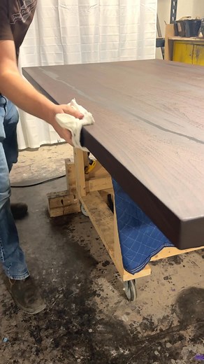 Oiling brings the table’s story to the surface, showing off the colour, texture, and character of the hardwood. Josh shows how a simple step creates such a dramatic transformation. https://www.loewendesignstudios.com/blogs/news/how-our-algonquin-collection-came-to-be?_pos=4&_sid=6b90b2bd4&_ss=r #customdiningtable #tablefinishing #behindthescenes #satisfying #transformation #woodshop | Loewen Design Studios
