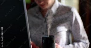 Air purifier and humidifier in office workplace. Climate control and air humidification in the office