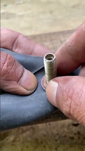 installing the valve stem on a motorcycle inner tube
