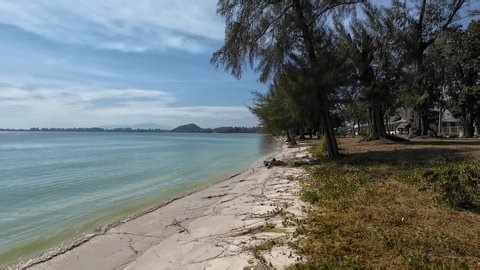 clip-3979127961-serene-180-degree-panoramic-left-right-tree-lined-shore