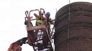 Crews begin demolition of historic Davenport Central Smokestack