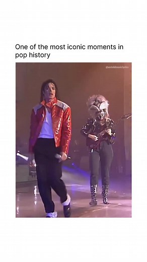 UntoldMusicLyrics on Instagram: "Michael Jackson’s “Beat It” live performance with guitarist Jennifer Batten is remembered as one of his most electrifying stage moments. With Jackson’s flawless charisma, sharp choreography, and unmatched stage presence, the performance becomes even more powerful when Jennifer Batten steps in with her blazing guitar solo. Her striking look, fierce energy, and technically brilliant playing perfectly complement Michael’s intensity, creating a thrilling rock pop fus