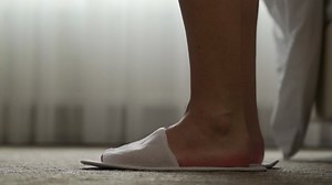 Woman Puts Feet Into White Slippers Stock Footage Video (100% Royalty-free) 1094080423 | Shutterstock