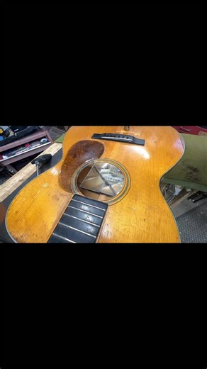 Massive 3.8mm thick “repair” bridge plate reveals the Original bridge plate which is in great condition. (The big one was glued ontop of the little one). Now to string it back up and recheck the top deflection with the Proper relief gauge from @guitarspecialistinc . (It had 0.010” deflection with both bridge plates in) 🎸 #luthierlife #woodworking #vintageguitar #vintagemartin #woodworkingskills #guitarist #guitarrepair #luthiery #luthiersofinstagram #guitarrepairs #whatsonyourbench #guitarrepai