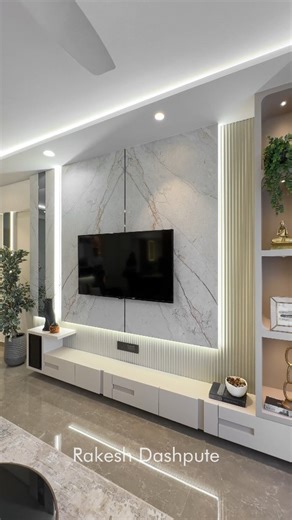 Rakesh Dashpute on Instagram: "Step into luxury with this modern living room design, featuring a plush sofa, sleek TV wall unit, and a relaxing swing. Designed for ultimate relaxation and modern living. . . Designed By: @aligninteriorsbyrakesh | @rdashpute . . #livingroom #livingroomdesign #livingroominterior #tvpanel #tvwall #swing #livingroomgoals #livingroomstyle #modernliving #interiordesigner #homedecorlovers"