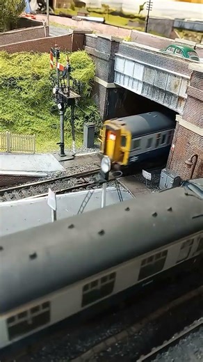A Class 74 electro-diesel, departs Yeovil Central