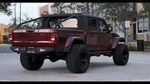 Limited edition - discontinued a rare Snazzberry colored SoFlo 4x4 2021 Jeep Gladiator. Stacked with a Raider hood, custom roll cage, steel bumper and winch, Halo headlights and King Ranch interior. 4” lift with 38” Patagonia tires and black 20” SFJ rims. #jeep #gladiator #jeepgladiator #4x4 #nft #bitcoin #supercars #truck #pickup #southflorida @miami._life | SoFlo Customs