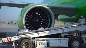 clip-1029711818-airport-airplane-aircraft-maintenance-luggage-loading-on