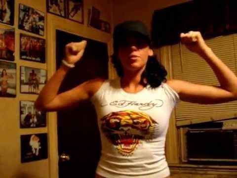 Julia flexing her biceps for gndflex.com