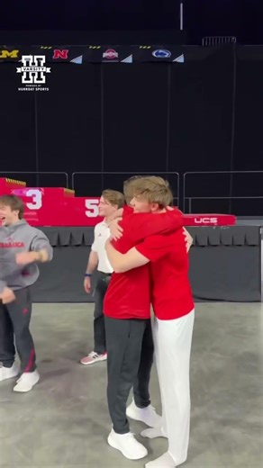 Nathan York claims the B1G championship in parallel bars. Caden Clinton in second place.