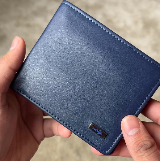 Practicality meets style.  Carry your essentials with ease in a premium bi-fold wallet designed for professionals like you. Enough space for cash, cards, and coins - no more cluttered pockets. Soft genuine leather ensures a smooth texture that's a pleasure to carry every day.  Luxury rigid box included - perfect as a gift or personal treat.  Available in Brown and Navy Blue. Visit www.evalgo.shop today! ❤️ | evalgo | Facebook