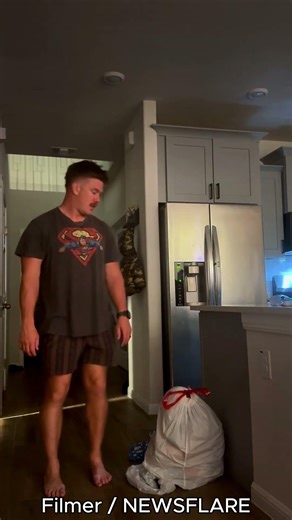 Daughter’s Bin Bag Prank Ends with Dad Popping His Knee in Viral Scare