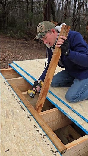 Installing OSB subflooring.