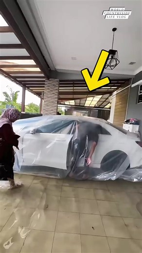 Resourceful guy protects his ride! Wrapping up the car to beat the flood #worldcountrysidelifevlog #FloodSmart #CarProtection #ProblemSolving DISCLAIMER NO COPYRIGHT INFRINGEMENT INTENDED | World Countryside Life Vlog