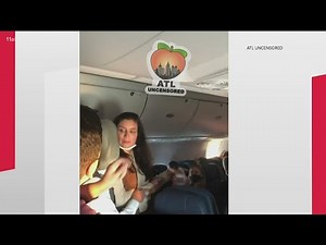 Woman detained after causing disturbance on flight to Atlanta, what charges she could face
