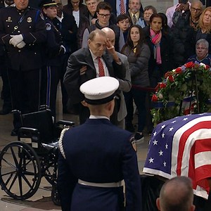 Bob Dole stands from wheelchair to join mourners honoring George H.W. Bush at the Capitol http://bit.ly/2Ec7e0l | TIME