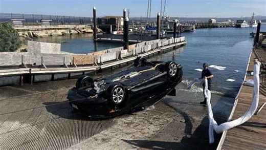 Monterey police investigate car submerged at Coast Guard Pier ramp