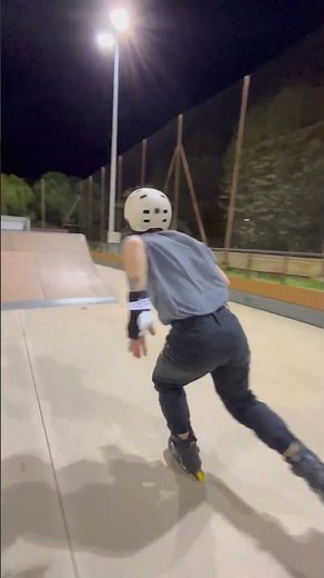 Nighttime Rollerblading Tricks at the Skatepark