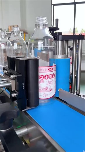 Full-automatic round bottle labeling machine