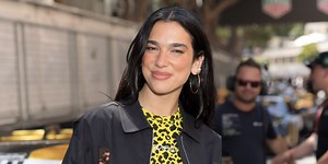 Dua Lipa Pairs Her Sparkly Studded Bikini with a Sheer Lace Skirt