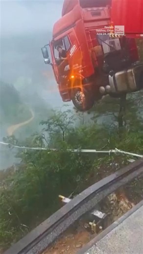 The Weather Channel on Instagram: "The stuff of nightmares: a semi-truck teeters off the edge of a bridge collapsed by a landslide on Tuesday morning after days of heavy rain in Guizhou, China."