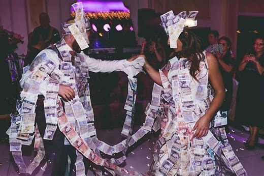 Pinning money to wedding dress greek | Honestweddingadvice.com