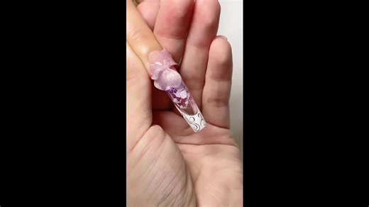 Making 3D flower nail art with purple and white shades