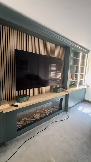 3.6K views · 19 reactions | One of our most elegant installs ‍ Get intouch via direct message or email - info@themediawallco.com #modern #new #nottinghamshire #derbyshire #tv #cinematic #nottingham #LED #fitted #green #fire #home #Oak #oakfurniture #SleekDesign #warmhome #warmandcozy #winter #Christmas #christmascountdown #tv #panelling #StorageSolutions #StorageGoals #storage | The media wall co - mansfield | Facebook