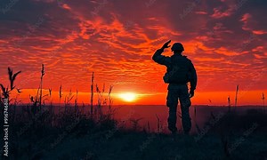 Soldier in uniform saluting outdoors. Military service