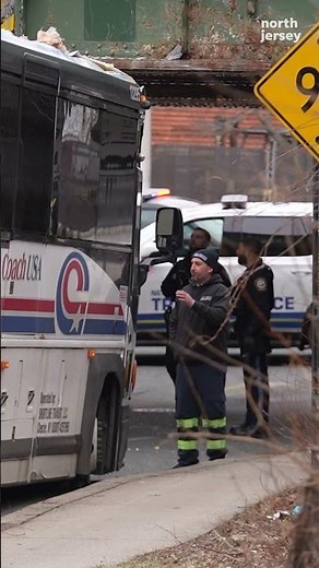 Watch bus crash into railroad bridge, tearing off its roof