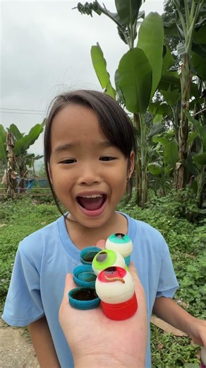 The kind little girl ate rainbow candy and drank cocacola very well. #funny #candy #food #cute