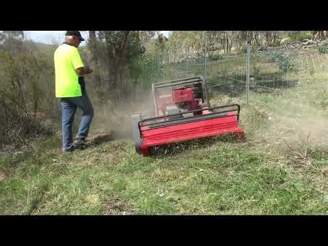 Trying out a tracked diesel slasher remote controlled