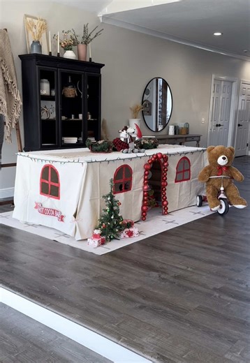 If you're looking for a fun DIY project to do for your kids this Holiday season, this might be the one for you! All you need is a drop cloth or sheet, paint, and any left over holiday decor!! Hope everyone has the best holiday season!!! #diy #blanketfort #tablefort