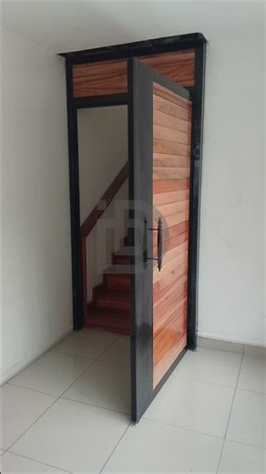 Composite wood and metal core security door.