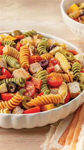 Our Grilled Chicken Pasta Salad is so simple and delicious that you’ll want to make it all summer long. And with timesaving shortcuts like our Italian-Style Marinated Chicken and packaged antipasto salad, you can! #PastaSalad #SummerRecipes #Wegmans -- Featured Products: Wegmans Italian-Style Boneless Skinless Chicken Breast Cutlets, Raised without Antibiotics Wegmans Rainbow Rotini Pasta Melissa’s Antipasto Olive Salad Wegmans Cherry Tomatoes on the Vine, Flavor Bombs Wegmans Organic Zesty Ital