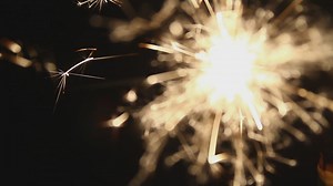 Sparkler burning brightly - Free Stock Video