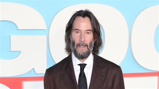 Fan tries to break in to Keanu Reeves's car as he leaves theatre