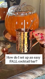 Easy Fall Cocktail Bar Setup 🎃 comment FALL for all of the goodies! And that pumpkin dispenser is a home run! Soooooo cute!!! Freeze mini tangerines and they turn into little mini pumpkins 💚 of course the first drink is a mocktail for children 💚 | Carmen Johnston Gardens