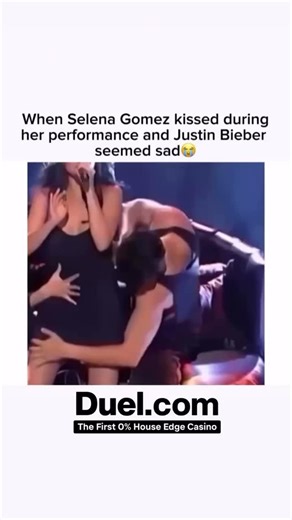 Guard Dogs Nation on Instagram: "During a live performance, Selena Gomez shared an unexpectedly intimate on-stage moment with another performer—while Justin Bieber watched from the sidelines. Fans couldn’t help but notice Justin’s expression, sparking a wave of speculation about his feelings. The moment quickly went viral, becoming a textbook example of awkward celebrity relationship tension under the spotlight."