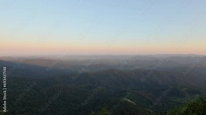 Panoramic sunset views across the Springbrook National Park including a view of Mount Warning in the distance