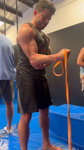 Falsegrip on Instagram: "Elbow and shoulder prep aren’t optional for rings - they are rings strength. Rings demand coherence - joints that can organise, stabilise, and respond instantly when the environment becomes chaotic. Today’s prep builds exactly that. Elbow work develops straight-arm strength through the brachialis and connective tissues, giving the elbow the capacity to stay locked and stable under shifting load. Shoulder work builds the workspace and reflexive control needed to keep the 