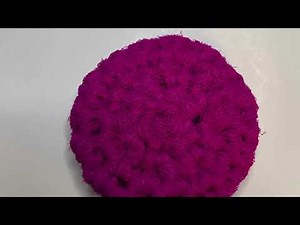 Crocheted puffy dish scrubby.
