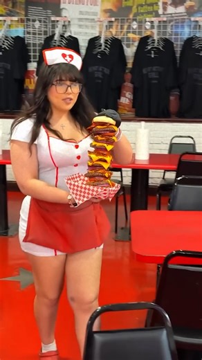 I head down to the wacky downtown Las Vegas Fremont Street to the famous Heart Attack Grill to take on their 20,000 calorie burger challenge! | Nathan Figueroa