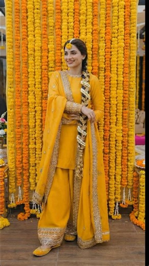 Hina Haram on Instagram: "Beautifully adorned with a floral-accented braid and traditional attire for the Haldi/Mayun function.🤍 Now you can customise your article with shalwar, sharara or sharara pants . Inbox for details or queries. #hinaharamofficial #fashionista #fashiondesigner #mayun"
