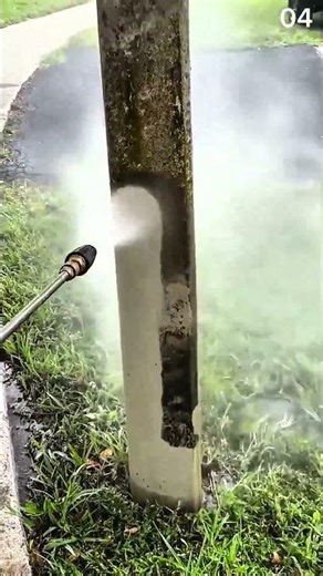 Power washer blasts grime off pole with sharp contrast