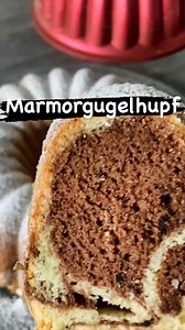 Rezept 4 Eigelb 250 g Zucker 1 P. Vanillezucker schaumig mixen 125 ml Milch 125 ml Öl Mixen -danach 250 g Mehl 1/2 P. Backpulver zum Schluss 4 Eiweiß steif mixen und unter den Teig heben Hälfte vom Teig mit 15 g Kakao vermischen und abwechselnd in die Backform geben . Bei 175 grad Heißluft 45 min backen #backen #marmorgugelhupf #foodblogliebe #foodblogliebebacken #foodies #foodiegram #foodlover #yum #instapic #foodblogger #delicious #foodbloggers #instagram #instagood #reel #becherkuchen #reels 