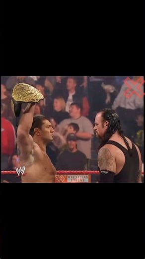 The Undertaker Chokeslams Batista